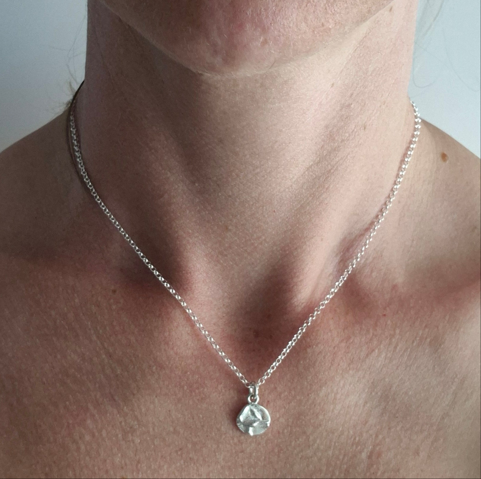 Flower sandcast charm necklace